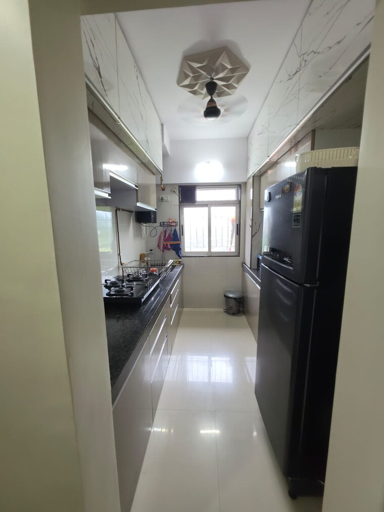 Kitchen, rdc-woods-teakwoods 2 Bedroom 950 Sq.Ft. Apartment In Ghodbunder Road Thane 10606171