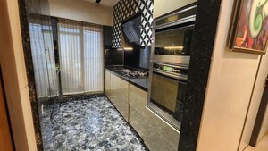 Kitchen in 2.5 BHK Apartment at Rosa Gardenia, Ghodbunder Road – for Sale