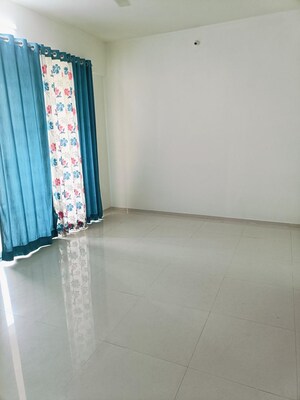 Bedroom in 2 BHK Apartment at Shreyas Palladium Grand, Dhanori – for Rent