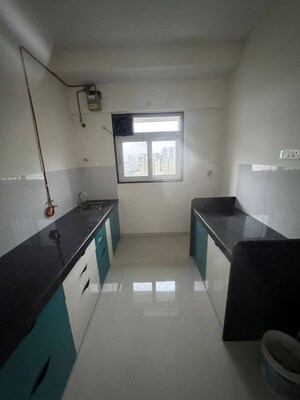 Kitchen in 2 BHK Apartment at Ashar Axis, Majiwada – for Sale