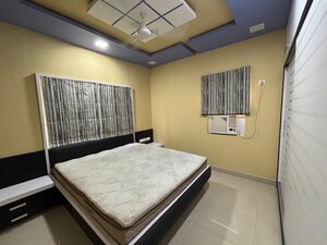 Bedroom in 2 BHK Apartment at Godrej Garden City, Jagatpur – for Rent