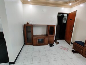 Living Room in 2 BHK Apartment at Rohan Garden, Kothrud – for Rent