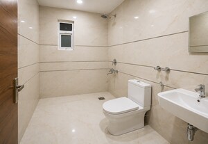 Bathroom in 3 BHK Builder Floor at Chattarpur – for Sale