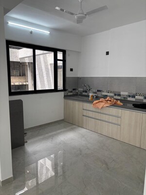 Kitchen in 2 BHK Apartment at Unique Youtopia, Kharadi – for Rent