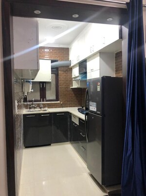 Kitchen in 2 BHK Builder Floor at Queens Plaza, Sector 43 – for Rent