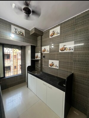 Kitchen in 1 BHK Apartment at Sai Nagar CHS, Kalamboli – for Sale