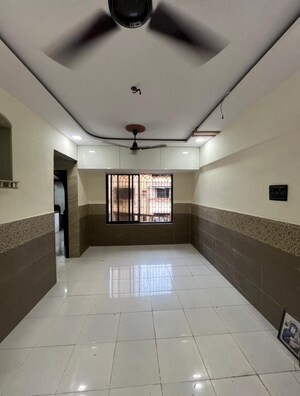 Living Room in 1 BHK Apartment at Sai Nagar CHS, Kalamboli – for Sale