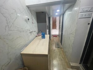Building Lobby in 1 BHK Apartment at Kemps Corner – for Rent
