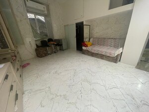 Living Room in 1 BHK Apartment at Kemps Corner – for Rent