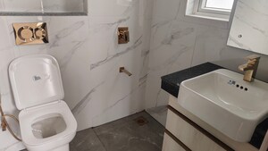 Bathroom in 3 BHK Apartment at Smart World Orchard, Sector 61 – for Rent