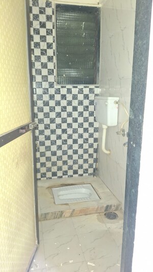 Bathroom in 2 BHK Apartment at K K Nehru Tower, Ulwe – for Rent