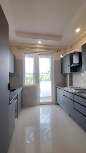 Kitchen in 3 BHK Builder Floor at Ansal API Esencia, Sector 67 – for Rent