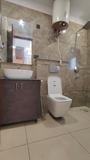 Bathroom in 3 BHK Builder Floor at Ansal API Esencia, Sector 67 – for Rent