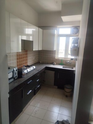 Kitchen in 2 BHK Apartment at Shree Vardhman Mantra, Sector 67 – for Rent