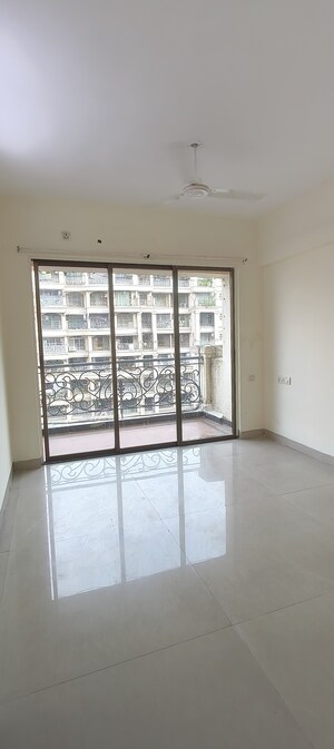 Room in 2 BHK Apartment at Tharwani Rosewood Heights, Kharghar Sector 10 – for Rent