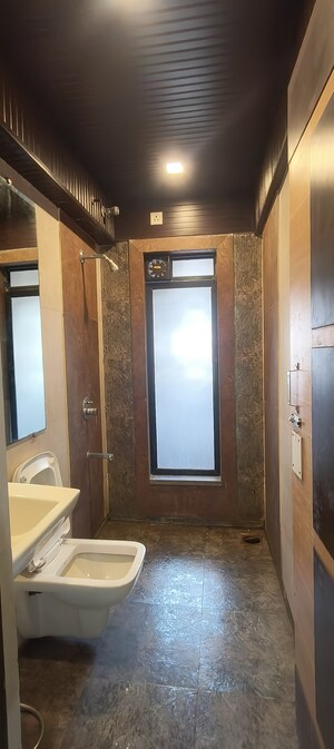 Building Lobby in 2 BHK Apartment at Tharwani Rosewood Heights, Kharghar Sector 10 – for Rent