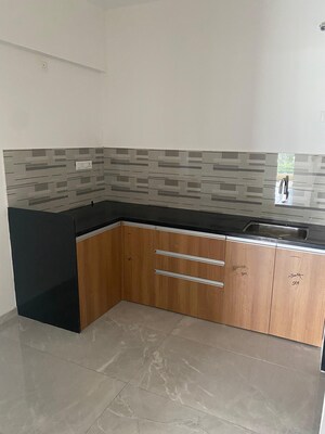 Kitchen in 3 BHK Apartment at Welworth Purnam, Hinjewadi – for Rent