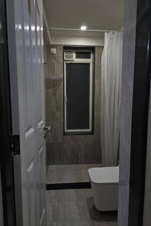 Bathroom in 1 BHK Apartment at Aspen Park, Goregaon East – for Rent