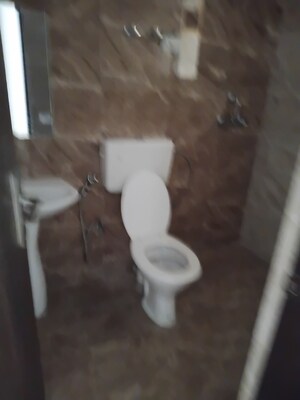 Bathroom in 3 BHK Apartment at Nirala Estate, Tech Zone 4 Greater Noida – for Rent