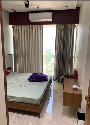 Bedroom in 2 BHK Apartment at Transcon Triumph Tower, Andheri West – for Sale