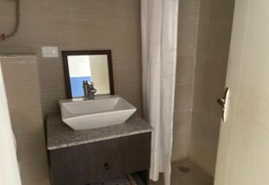 Bathroom in 3 BHK Apartment at Paras Dews, Sector 106 – for Rent