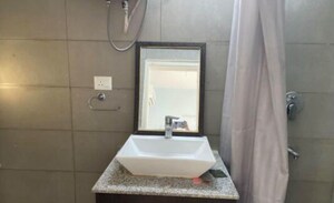 Bathroom in 3 BHK Apartment at Paras Dews, Sector 106 – for Rent
