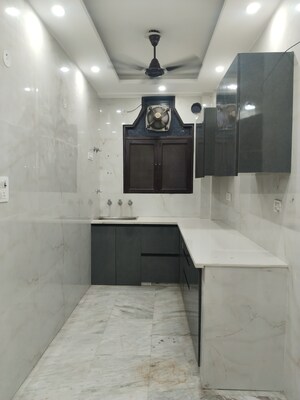 Kitchen in 3 BHK Builder Floor at Ashoka Enclave 3, Sector 35 – for Rent