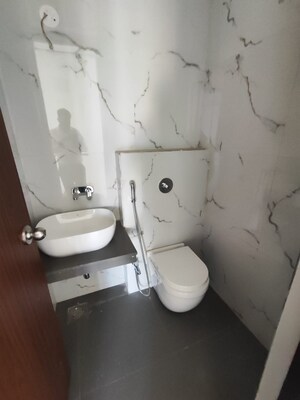 Bathroom in 4 BHK Apartment at Raj Tattva, Kapur Bawdi – for Sale