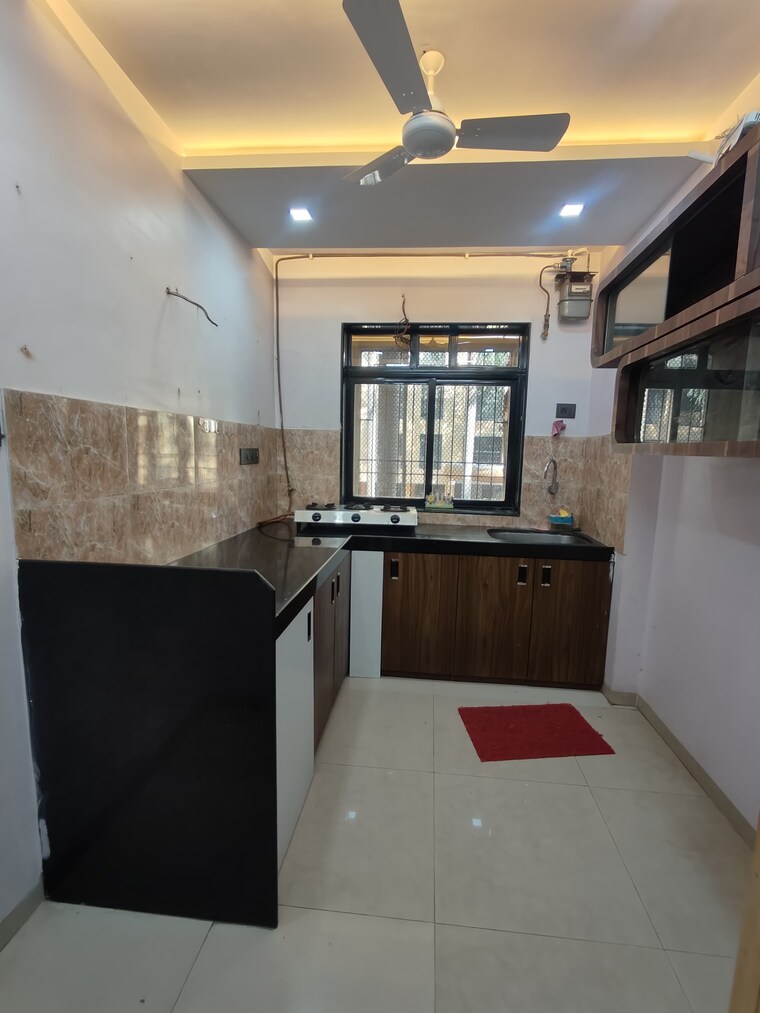 Kitchen, raunak-unnathi-gardens 2 Bedroom 750 Sq.Ft. Apartment In Pokhran Road No One Thane 10646640