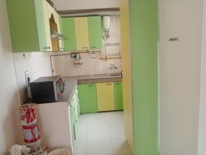 Kitchen in 3 BHK Apartment at Unitech Uniworld Gardens 2, Sector 47 – for Rent