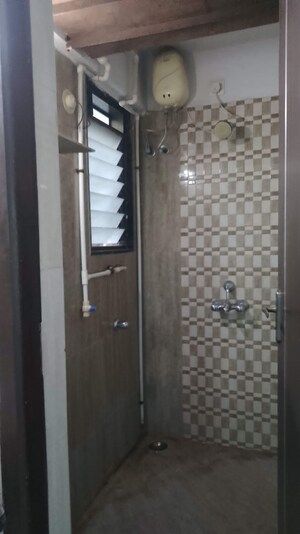 Bathroom in 1 BHK Apartment at Regency Sarvam, Titwala – for Rent