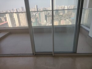 Building Lobby in 4 BHK Apartment at Omkar Alta Monte, Malad East – for Rent