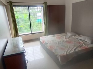 Bedroom in 1 BHK Apartment at Magarpatta Jasminium, Hadapsar – for Rent