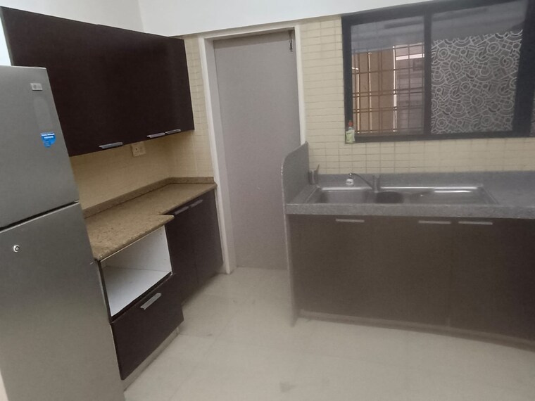 Kitchen, magarpatta-jasminium 1 Bedroom 550 Sq.Ft. Apartment In Hadapsar Pune 10651552
