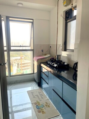 Kitchen in 2 BHK Apartment at Lodha Crown Quality Homes, Majiwada – for Rent