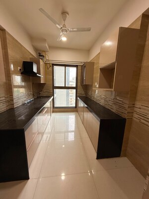 Kitchen in 2 BHK Apartment at Raj Infinia, Malad West – for Sale