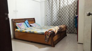 Bedroom in 2 BHK Apartment at Vastushodh Cavansite, Warje – for Rent