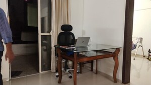 Living Room in 2 BHK Apartment at Vastushodh Cavansite, Warje – for Rent