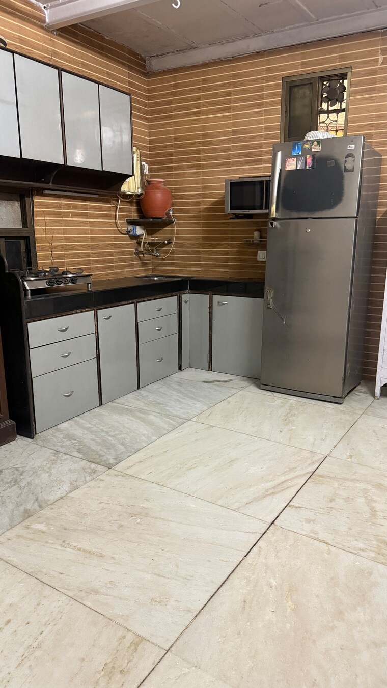 Kitchen, nirlon-knowledge-park 2.5 Bedroom 750 Sq.Ft. Independent House In Goregaon East Mumbai 10651617