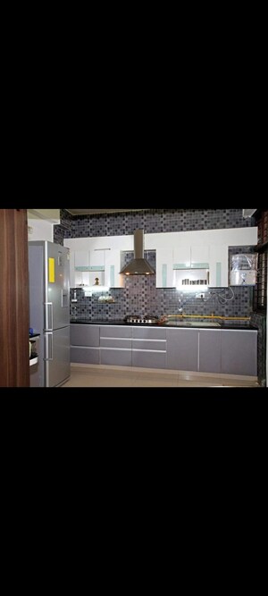 Kitchen in 3 BHK Apartment at Indraprasth Corporate, Prahlad Nagar – for Rent