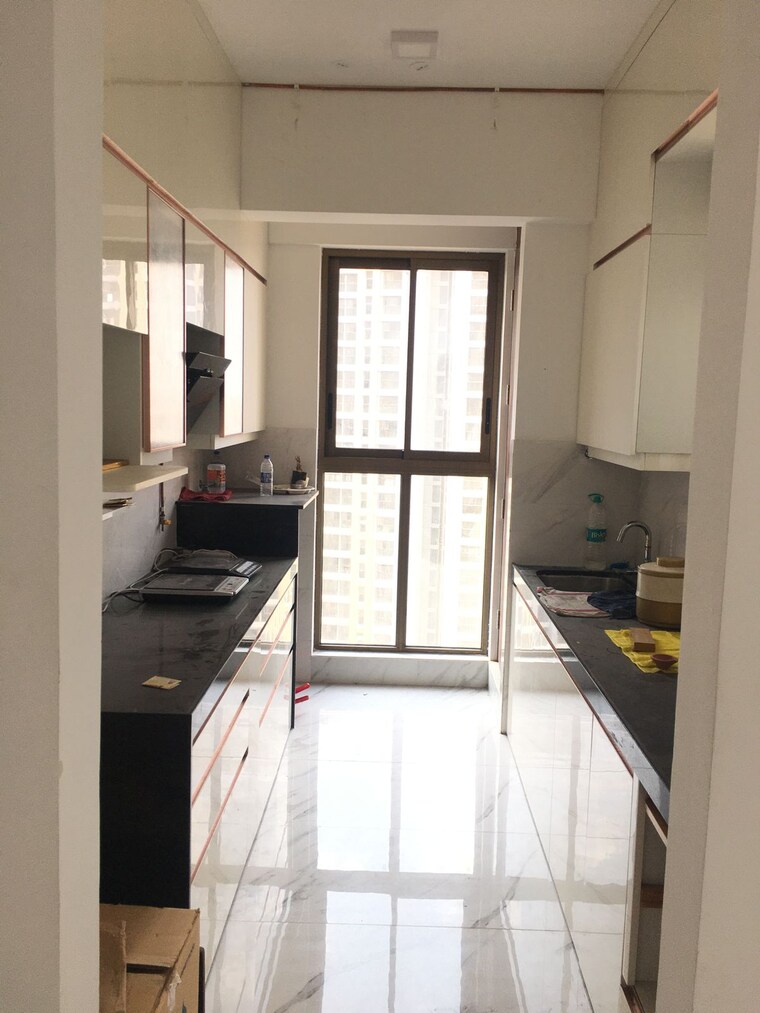 Kitchen, raymond-ten-x-habitat 2 Bedroom 800 Sq.Ft. Apartment In Pokhran Road No Two Thane 10651741