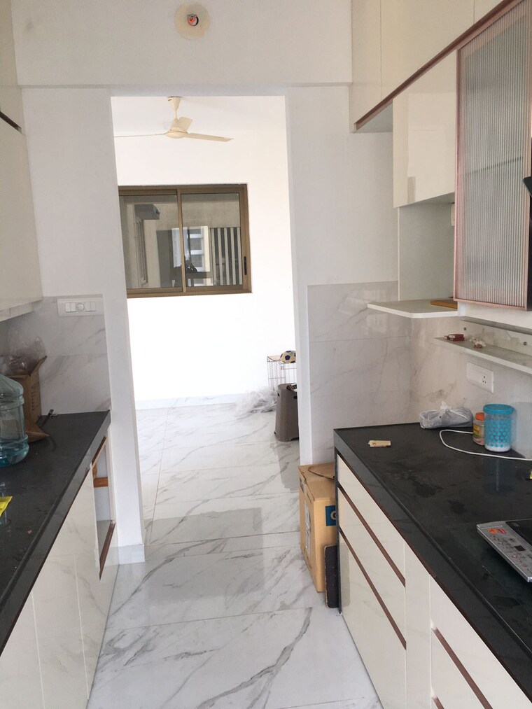 Kitchen, raymond-ten-x-habitat 2 Bedroom 800 Sq.Ft. Apartment In Pokhran Road No Two Thane 10651741