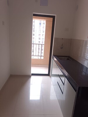 Kitchen in 1 BHK Apartment at Shapoorji Pallonji Joyville Hadapsar Annexe, Hadapsar – for Rent