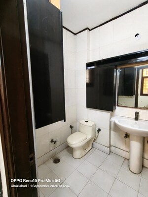 Bathroom in 4 BHK Builder Floor at Niti Khand I – for Rent