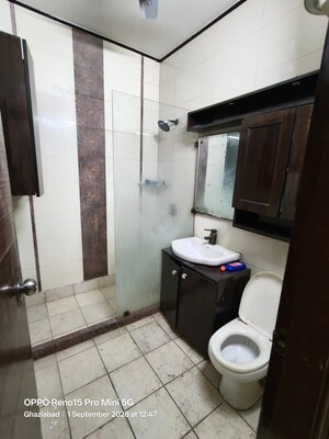 Bathroom in 4 BHK Builder Floor at Niti Khand I – for Rent
