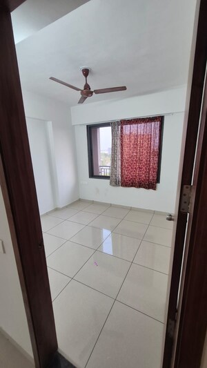 Building Lobby in 2 BHK Apartment at Sunbuildcon Suryansh Sanidhya Shivalaya, Sarkhej – for Rent