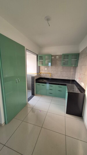 Kitchen in 2 BHK Apartment at Sunbuildcon Suryansh Sanidhya Shivalaya, Sarkhej – for Rent