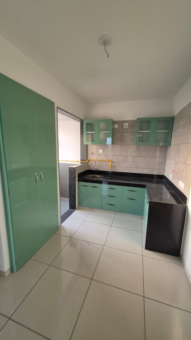 Kitchen, sunbuildcon-suryansh-sanidhya-shivalaya 2 Bedroom 1080 Sq.Ft. Apartment In Sarkhej Ahmedabad 10651795