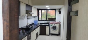 Kitchen in 2 BHK Apartment at Rohit Towers, Malad West – for Rent
