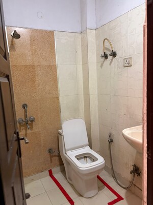 Bathroom in 2 BHK Builder Floor at Shakti Khand Iii – for Rent